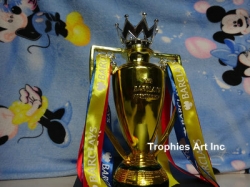 The Arsenal Gold Premier League trophy